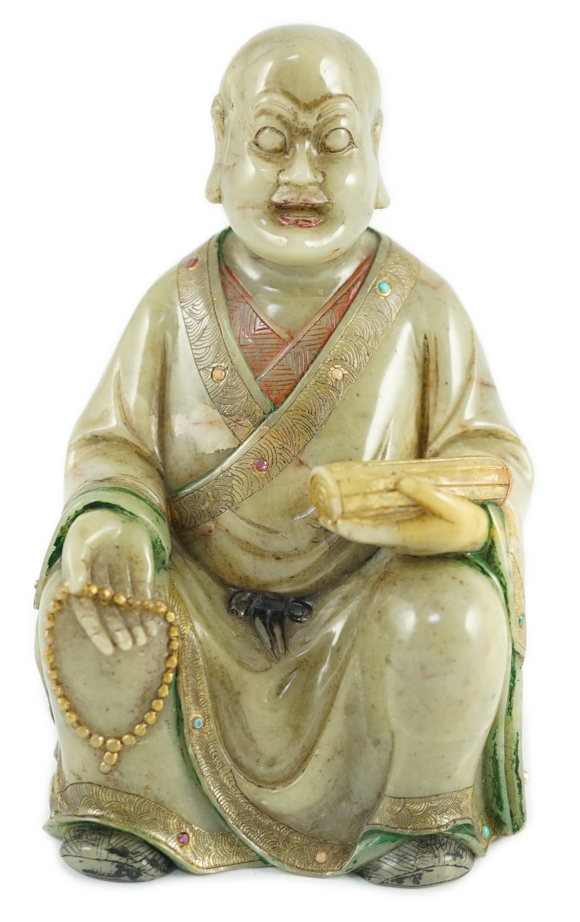 A Chinese soapstone seated figure of a luohan, 18th century, 12.5cm high